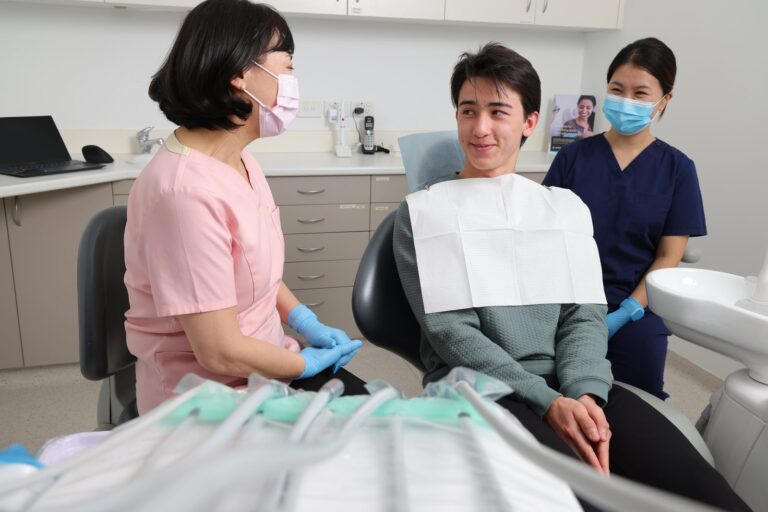 Dentist preparing a patient for treatment